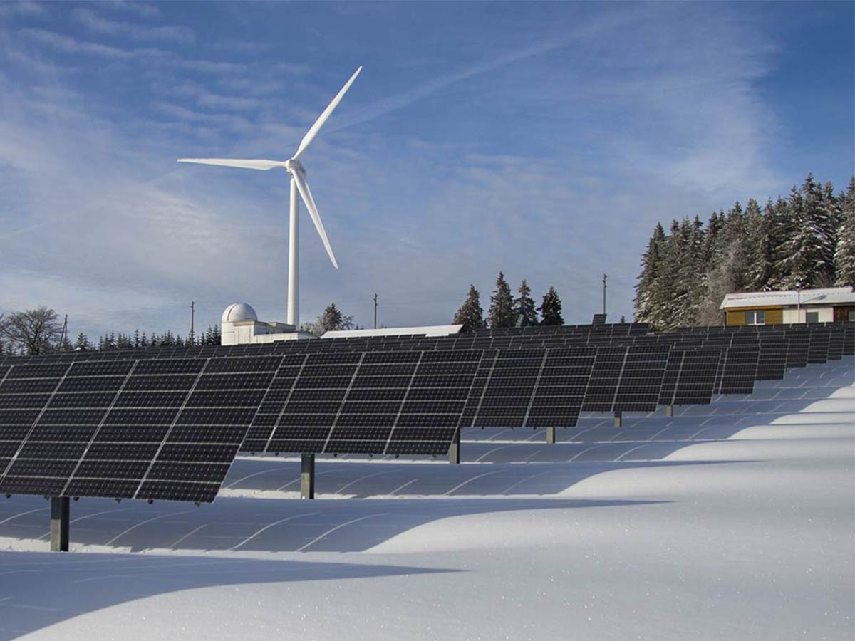 Ceramic coated solar panels surrounded by snow during winter