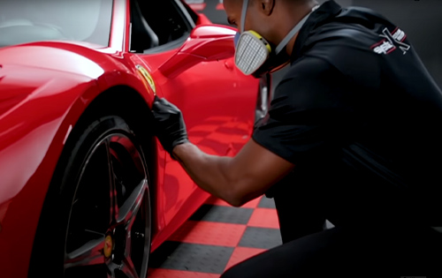 System X ceramic coating being applied to a Ferrari
